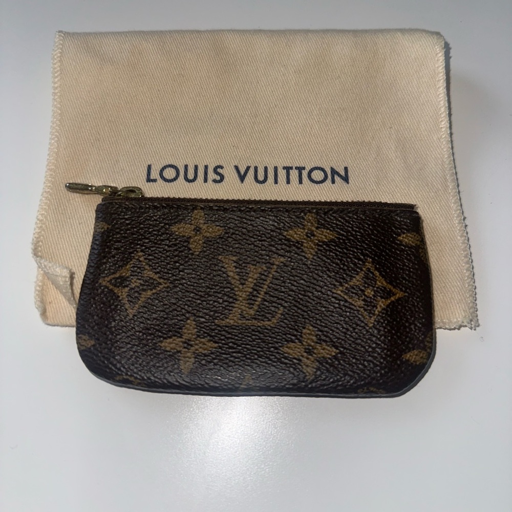 Louis Vuitton key pouch monogram.